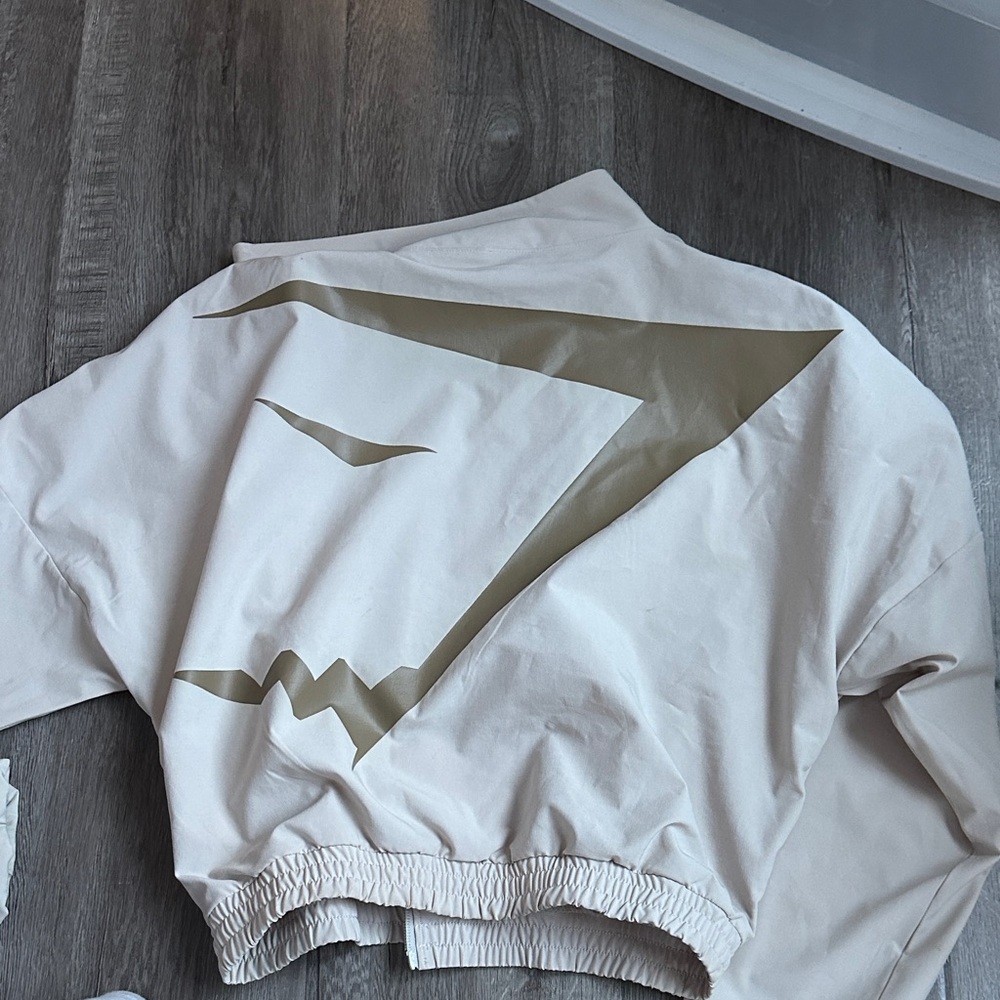 Gymshark Beige Cropped Jacket with Graphic Design